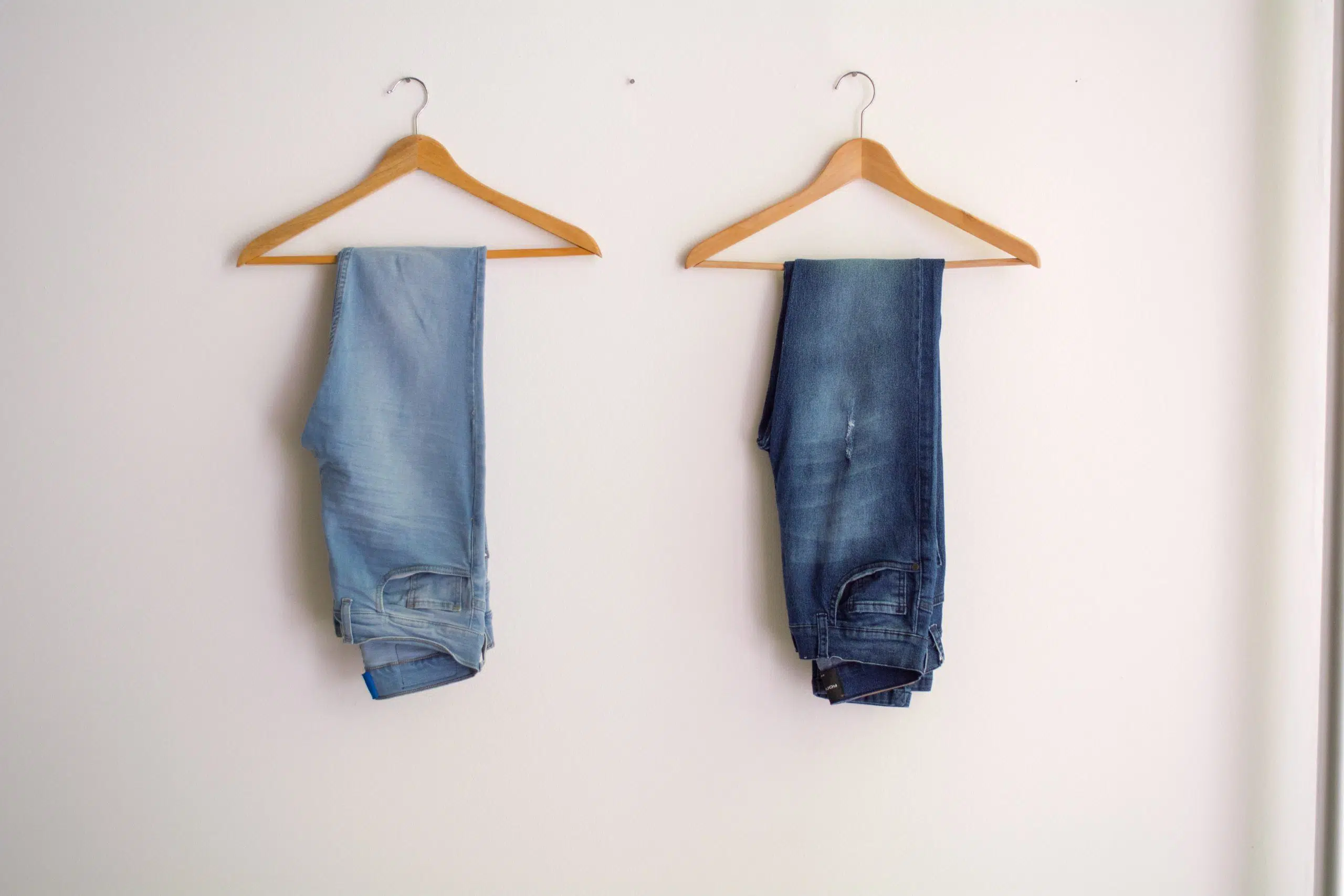 two-hanged-blue-stonewash-and-blue-jeans-1082528